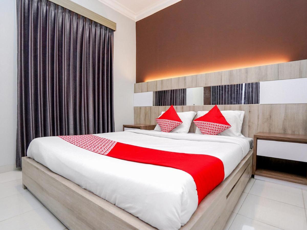Oyo 747 Cipunegara Residence Surabaya Buitenkant foto